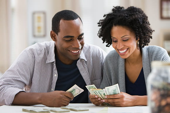 A couple counting and separating cash