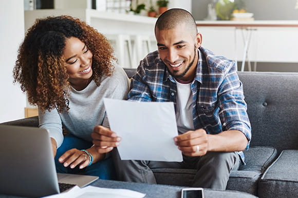 Couple working on a laptop