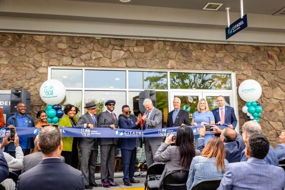 A group of officials at the Overbrook Park branch ribbon cutting